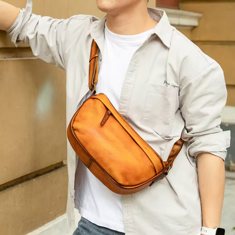 Urban commuter wearing men genuine leather chest bag 9261 in city street setting